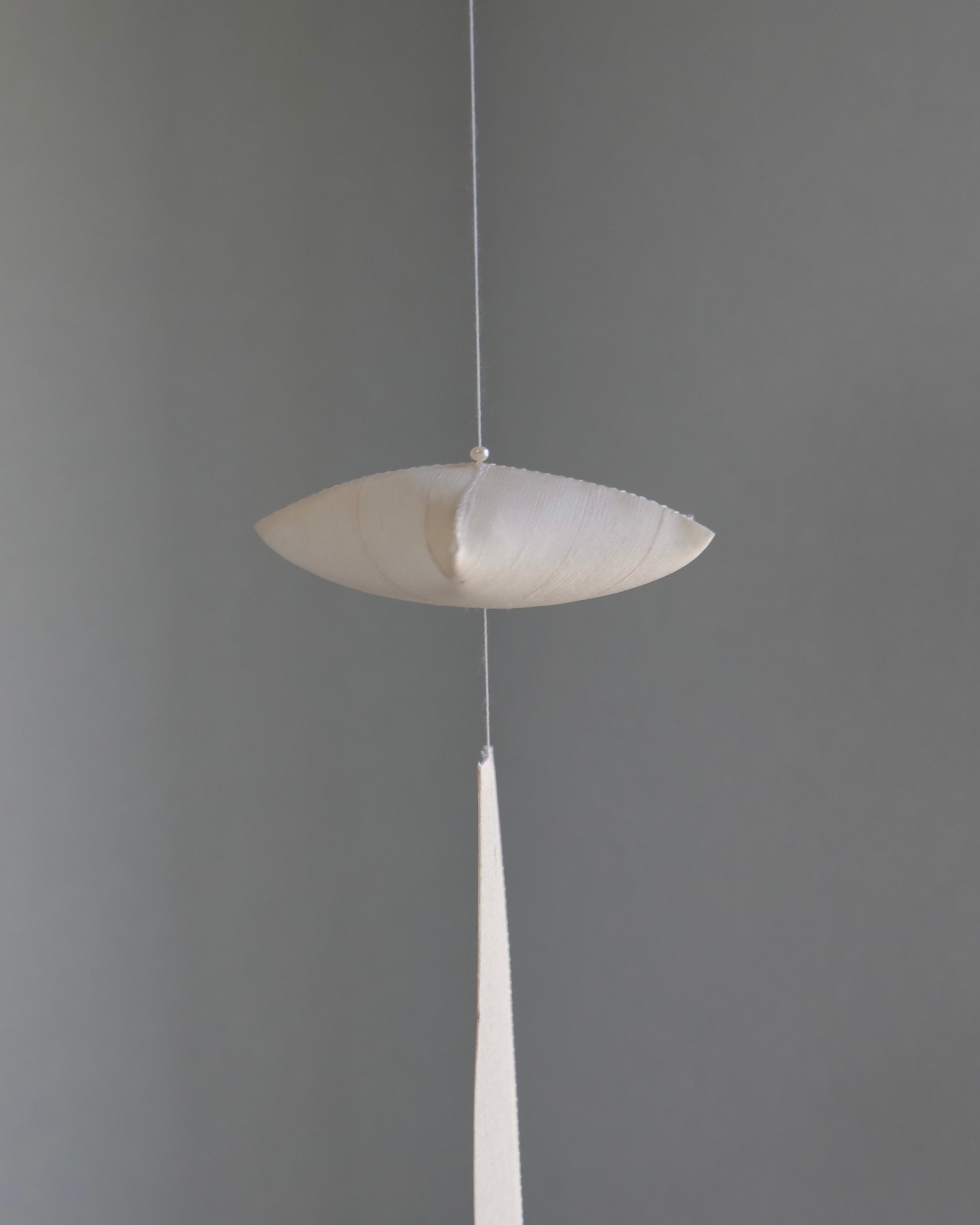 Yuree Oksa Silk Mobile — handwoven translucent silk dome and slat, a hanging mobile